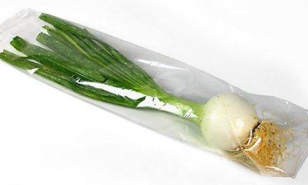 Envasado de manojo de puerros en flow pack de Ulma